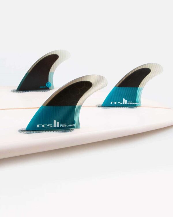 FCS Performer Thruster set in surfboard